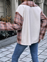Houndstooth plaid contrast panel shacket in deep red with a cream body and collar.