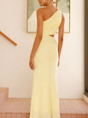 Yellow one-shoulder maxi dress with cutout detail and floral appliqué.