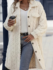 Cream textured shacket-coat with patch pockets and button front, worn open over a white top and jeans.