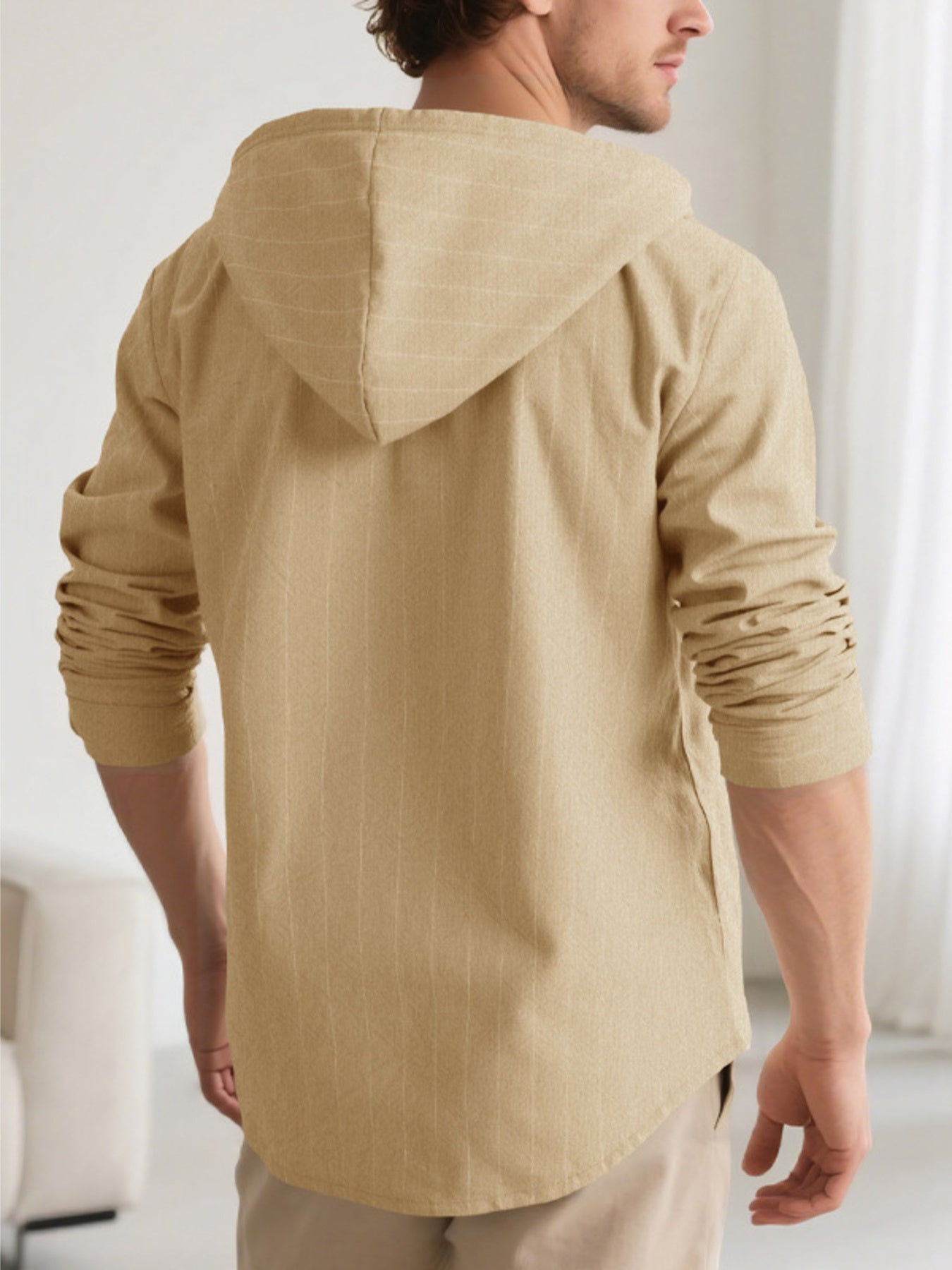 Khaki cotton hooded button-up shirt for men with subtle vertical pinstripes.