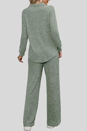 Sage ribbed knit lounge set with collar, long sleeves, and wide leg pants.