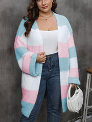 Chunky stripe open-front cocoon cardigan in blush pink, white, and pastel yellow acrylic with wide sleeves.
