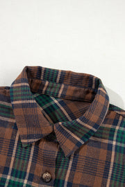 Plaid snap jacket in caramel with a collared neckline and button detail.