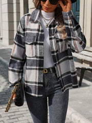 Black plaid overshirt with patch pockets and button front, styled with jeans.