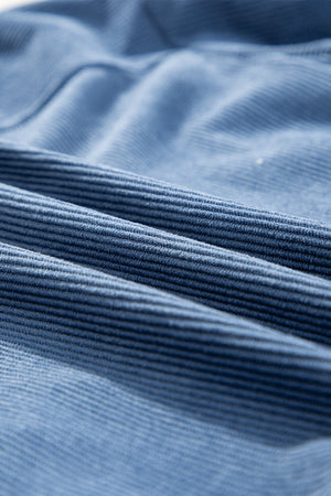Dusty blue corduroy bomber jacket fabric detail