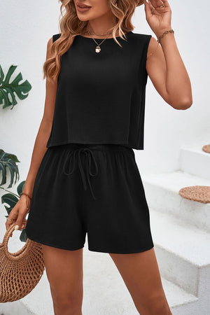 Black textured crop top and shorts set with adjustable drawstring shorts