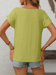 Yellow-Green eyelet knit tee with short sleeves and a scoop neck, featuring a textured pattern and shoulder buttons.