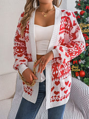 Festive jacquard open-front cardigan in white and deep red with heart and snowflake patterns.