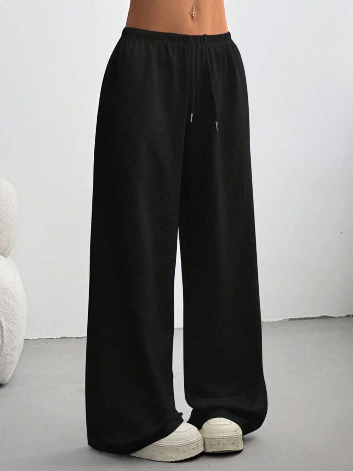 Black casual wide-leg maternity pants with drawstring waist and ankle length.
