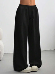 Black casual wide-leg maternity pants with drawstring waist and ankle length.