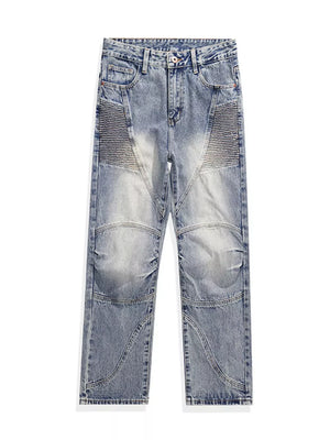 Men's light wash wide-leg jeans with moto-inspired paneling and ribbed detailing.