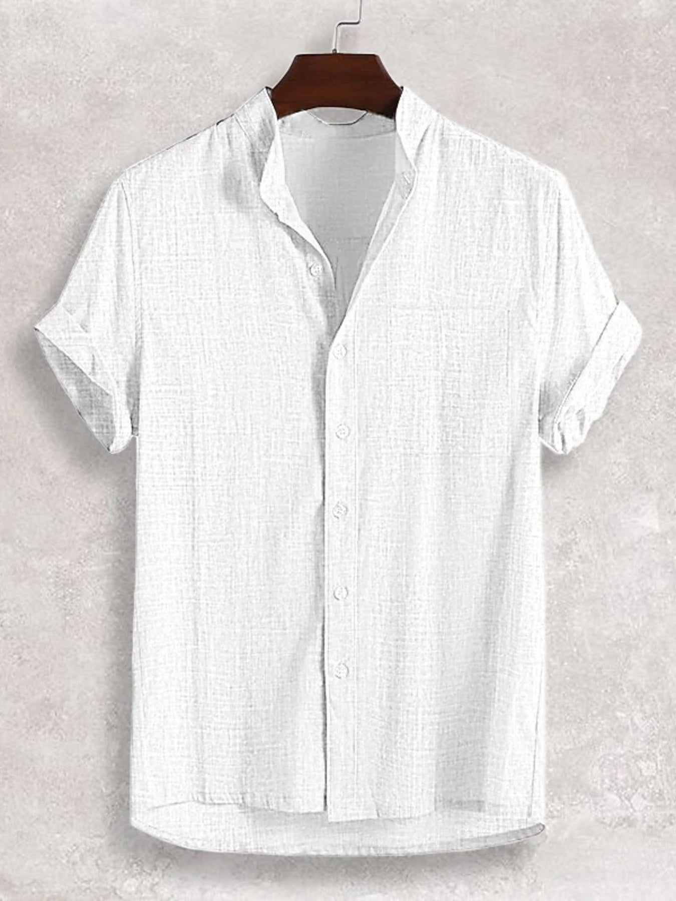 White textured band collar casual shirt with short sleeves and button front.
