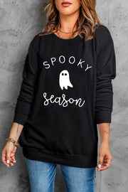 Black crewneck sweatshirt with white "Spooky Season" ghost graphic, casual fit.