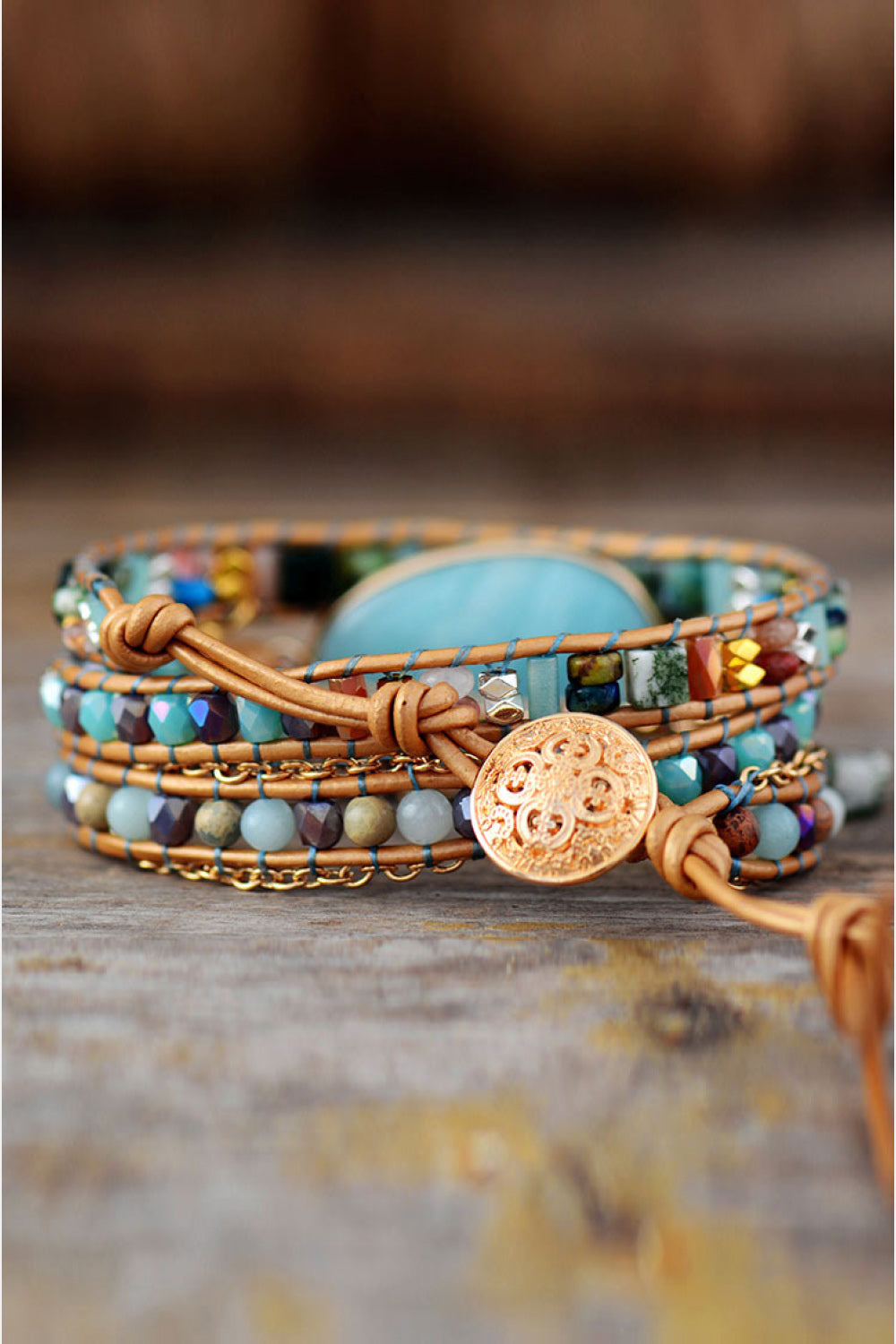 Aqua amazonite and beaded wrap bracelet with leather and gold chain details.