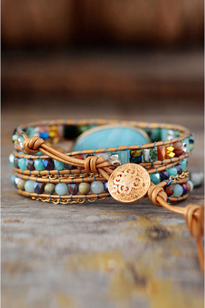 Aqua amazonite and beaded wrap bracelet with leather and gold chain details.