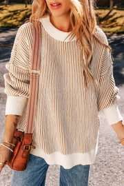 Camel and white vertical stripe drop-shoulder knit sweater with crew neck and long sleeves.