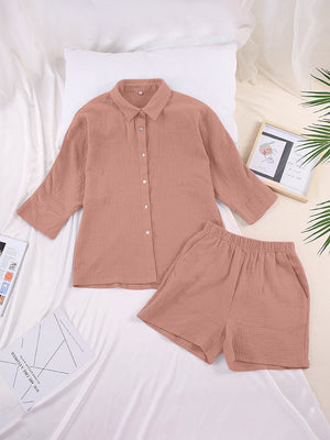 Gauze cotton resort shirt and shorts set in coral, featuring a button-down shirt and elastic waist shorts.