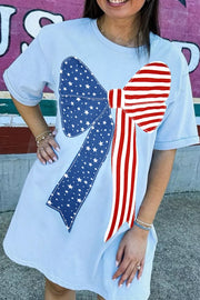 Light blue t-shirt dress with patriotic bow graphic, cotton blend.
