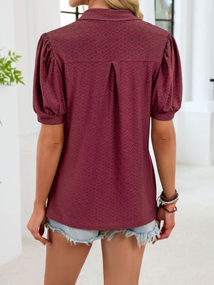 Wine red eyelet collar top with puff sleeves and back pleat detail.