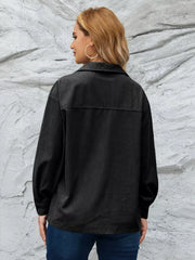 Black corduroy button-up jacket with textured fabric and a collared neckline.