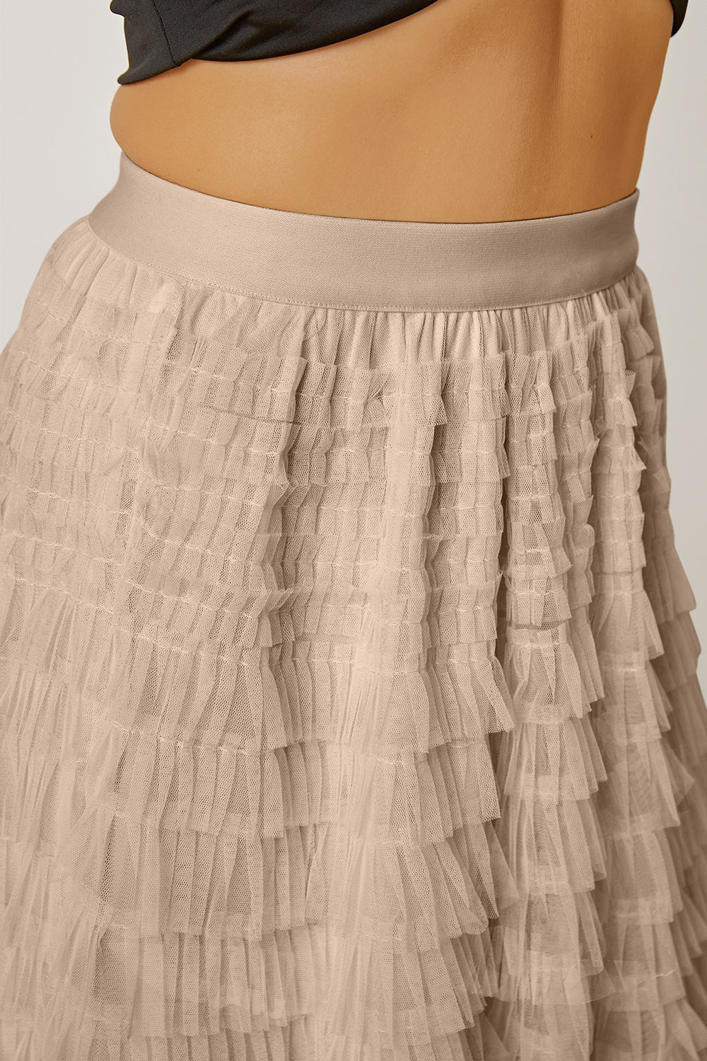 Tiered tulle maxi skirt in khaki with ruffled layers and a comfortable elastic waistband.
