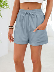 Blue casual shorts with elastic waist, drawstring, and pockets.