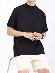 Men's black short sleeve mock neck knitted t-shirt with ribbed hem.