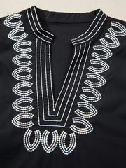 Black maternity overshirt with white embroidery detail on neckline and V-neck.
