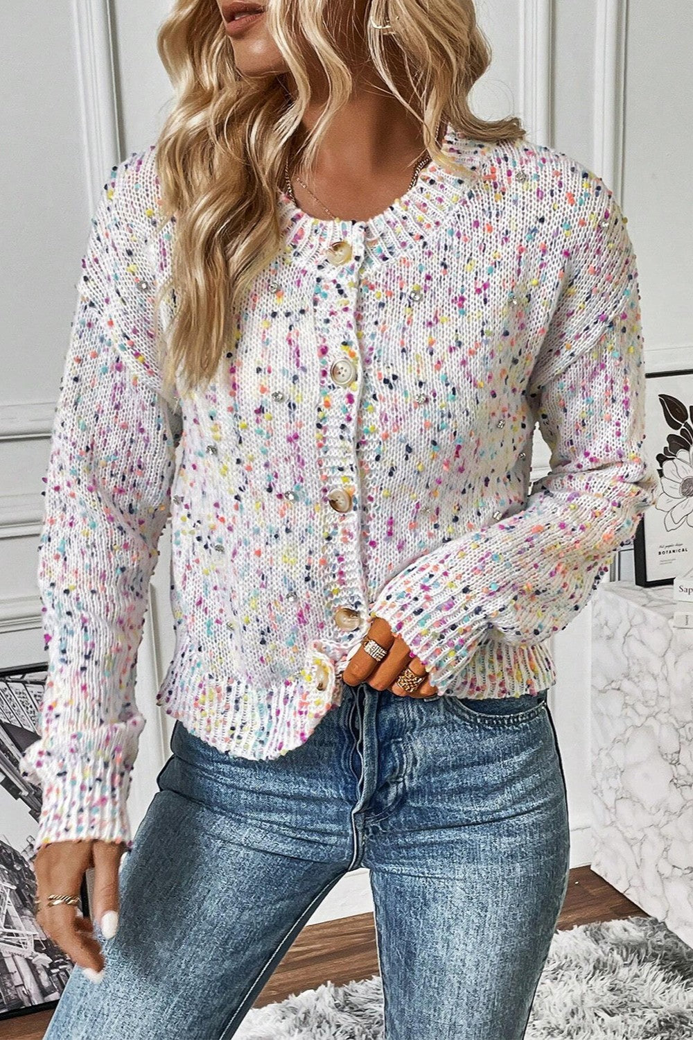 Confetti knit button-up cardigan in white with colorful speckles and button details.