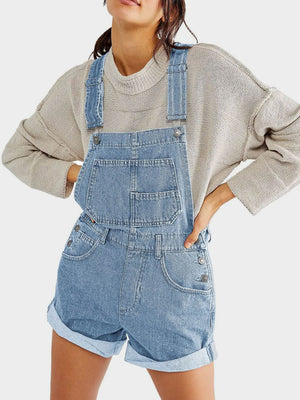 Light wash denim short overalls with rolled hem and front bib pocket.