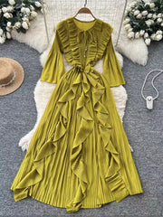 Green Yellow A-line midi dress with cascading ruffles, tie neck, and bell sleeves.