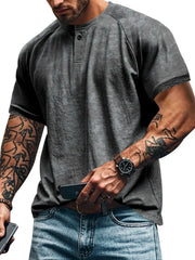 Gray textured henley tee with raglan sleeves and button placket.