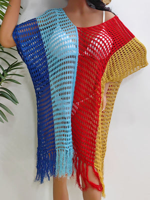 Colorblock crochet cover-up with fringe in blue, red, and yellow.