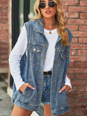 Longline denim vest in light wash with utility pockets and collared neckline.