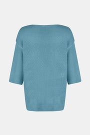 Pastel Blue V-neck knit sweater with flared sleeves and ribbed cuffs.