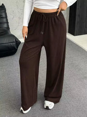 Brown drawstring wide-leg maternity pants with a comfortable, casual fit.