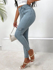 Light wash denim jeans with buckle detail on the leg
