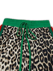 Leopard print loungewear pants with green drawstring and elastic waist