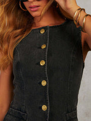 Dark denim vest with asymmetric button closure and gold buttons.