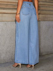 Light wash denim wide-leg jeans with button detail and back pockets.