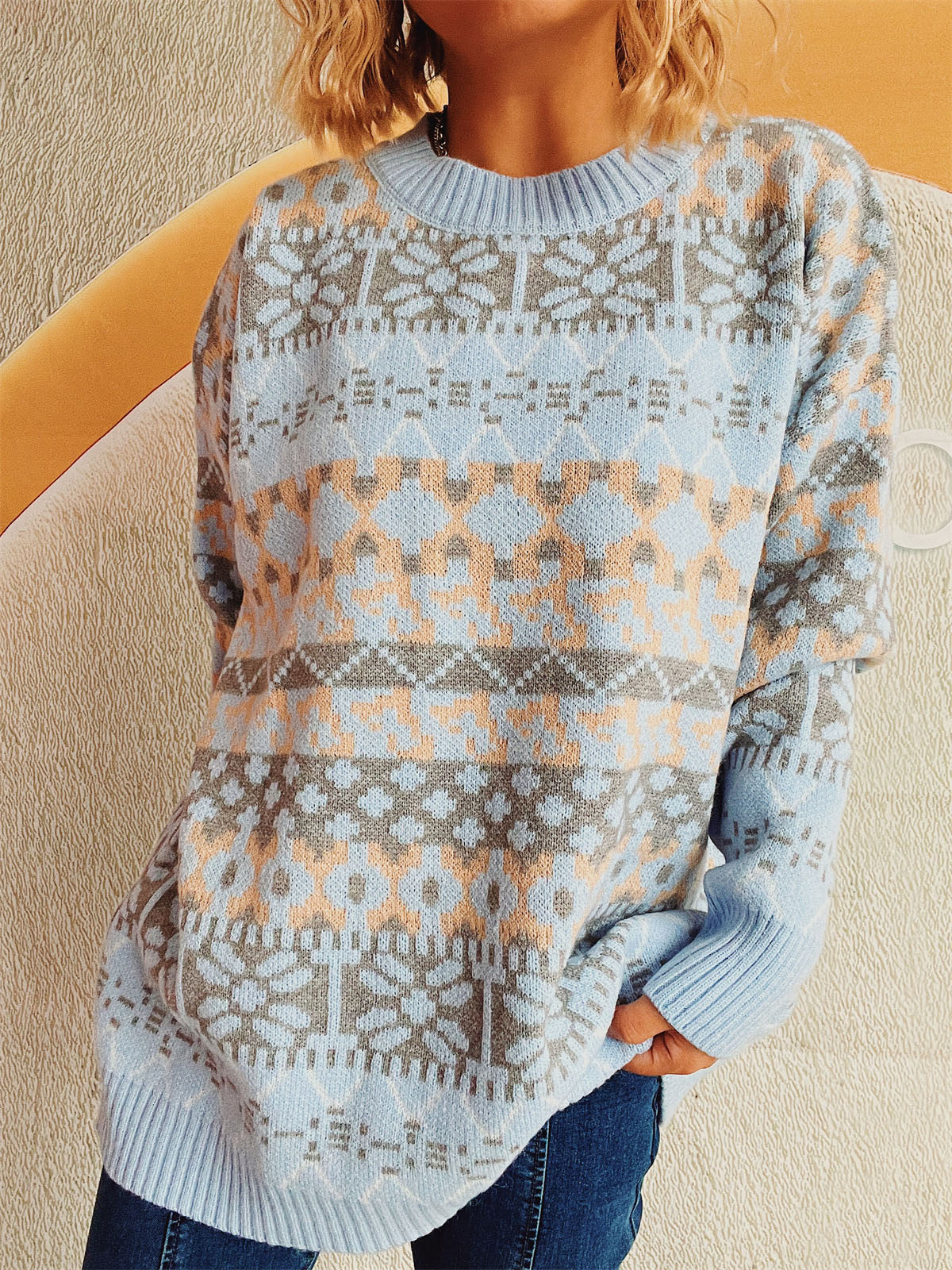 Light blue acrylic Fair Isle knit oversized sweater with crew neck and long sleeves.