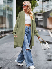 Open-stitch waffle knit duster cardigan in Matcha Green with pockets and long sleeves.