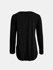 Black long sleeve tee with asymmetrical hem and button detail