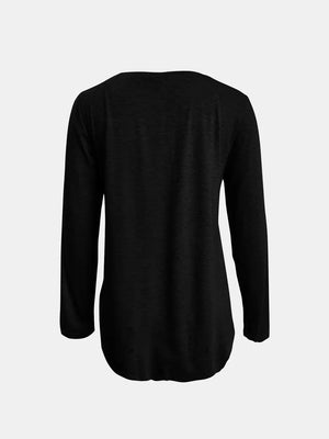 Black long sleeve tee with asymmetrical hem and button detail
