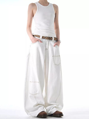 White cotton wide-leg jeans with contrast stitching and functional pockets.