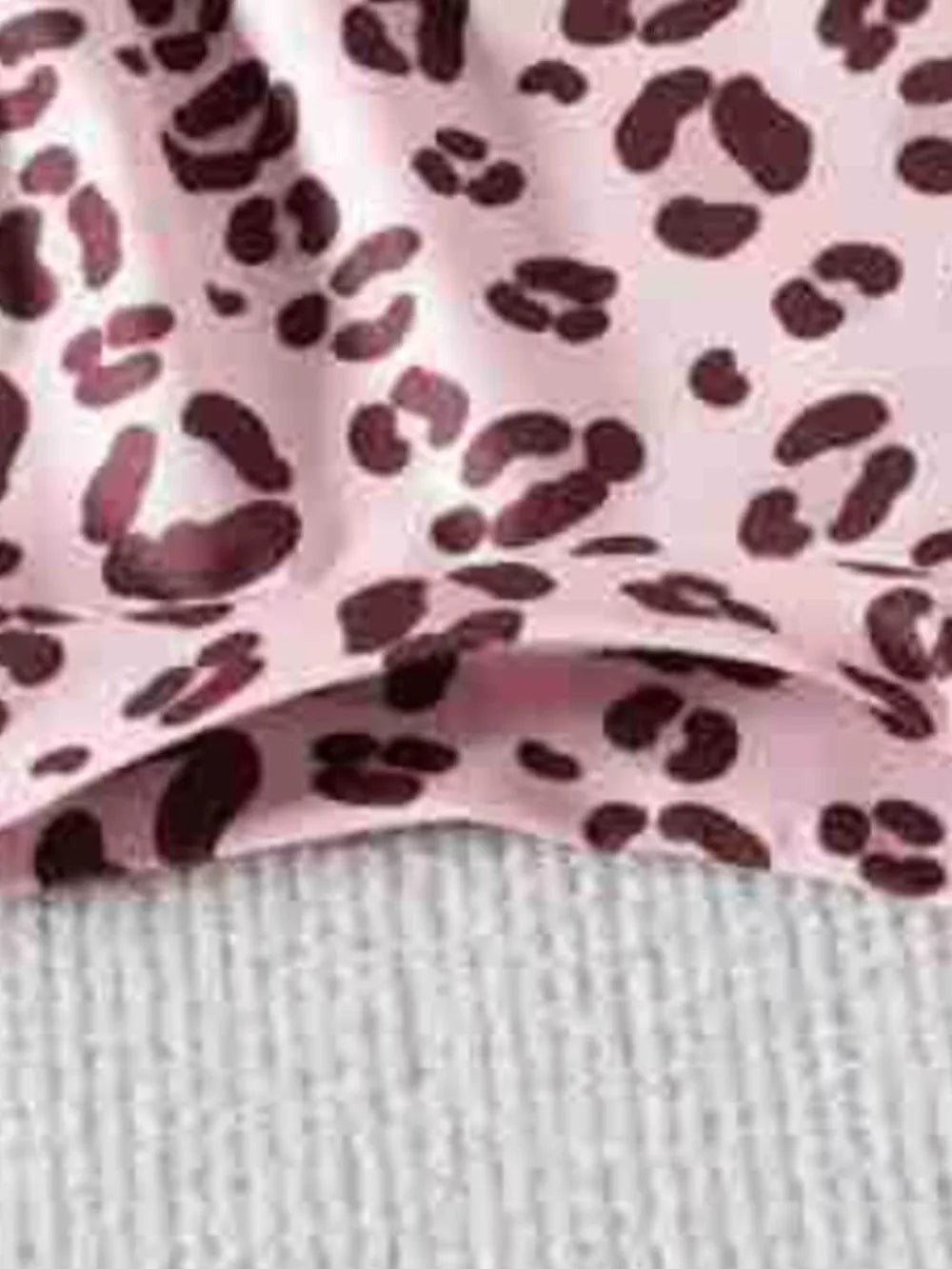 Blush pink baby shorts with leopard print detail
