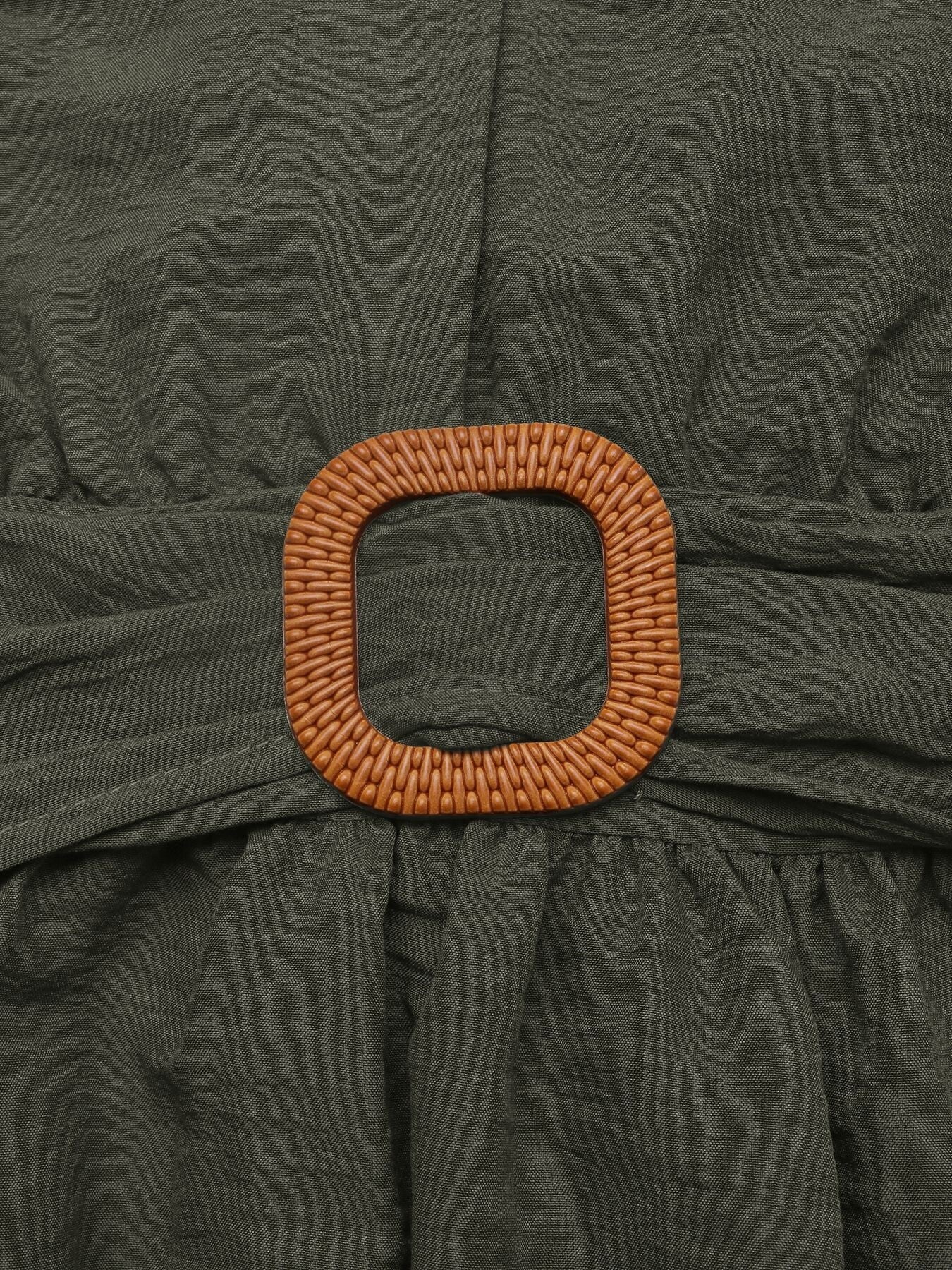 Bohemian maxi dress in olive green with a woven buckle detail and tiered skirt.
