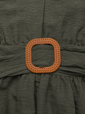 Bohemian maxi dress in olive green with a woven buckle detail and tiered skirt.