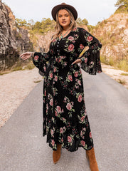 Black floral print viscose maxi dress with bell sleeves and button front