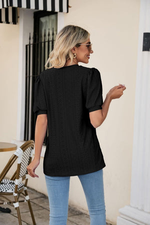 Black perforated puff sleeve v-neck blouse with eyelet detail